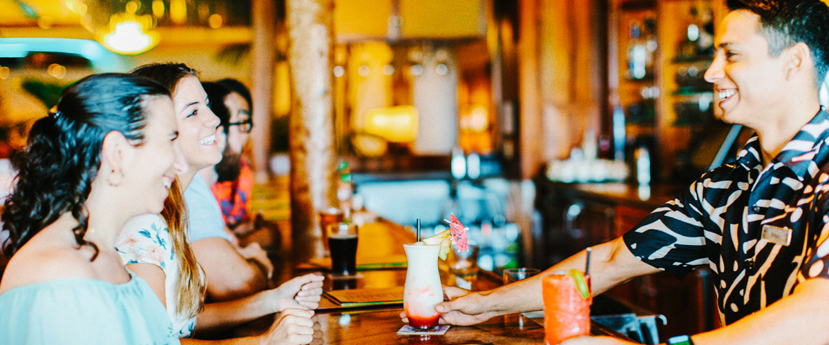 Customers ordering tropical drinks